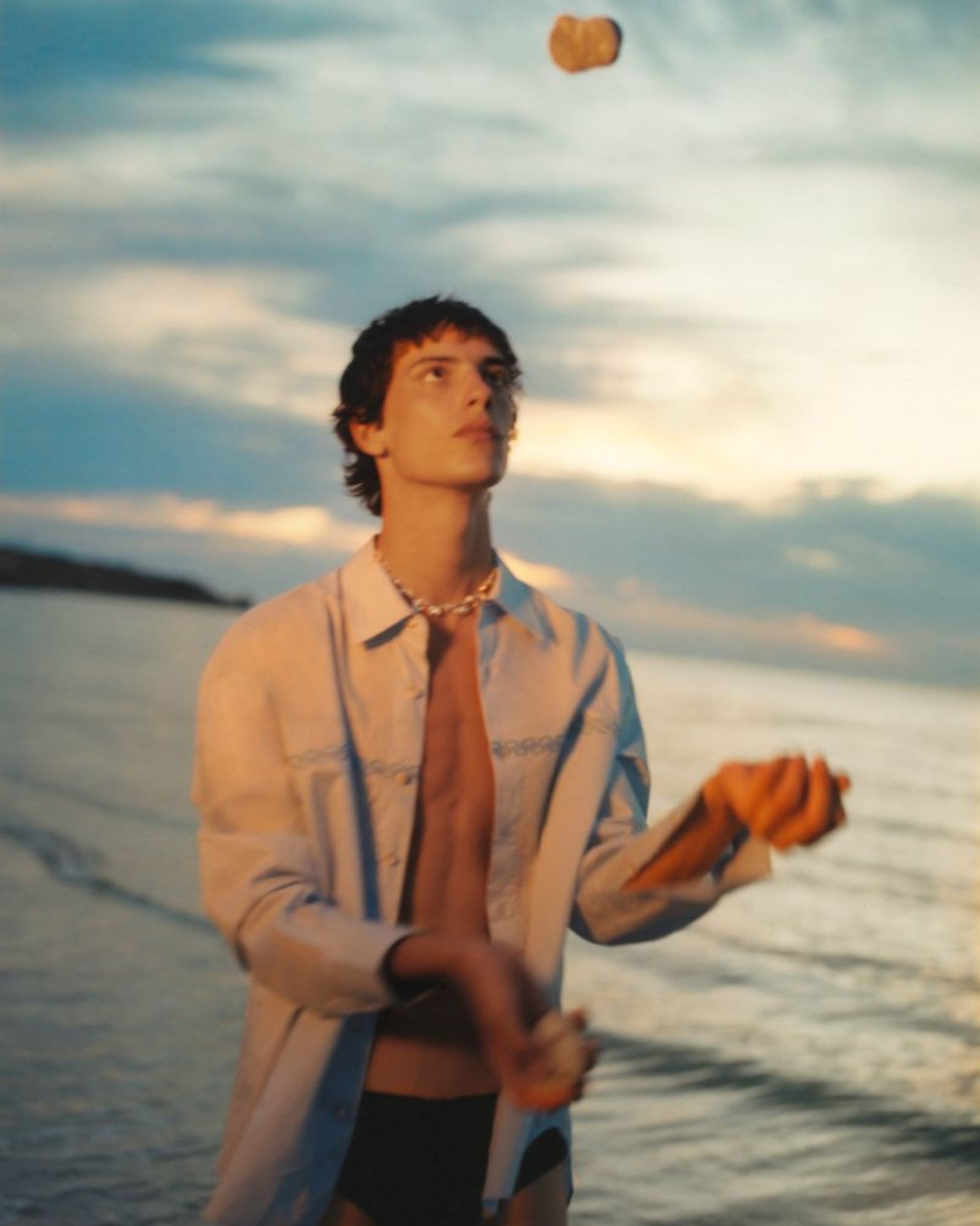 Campaign image of men's embroidered shirt.