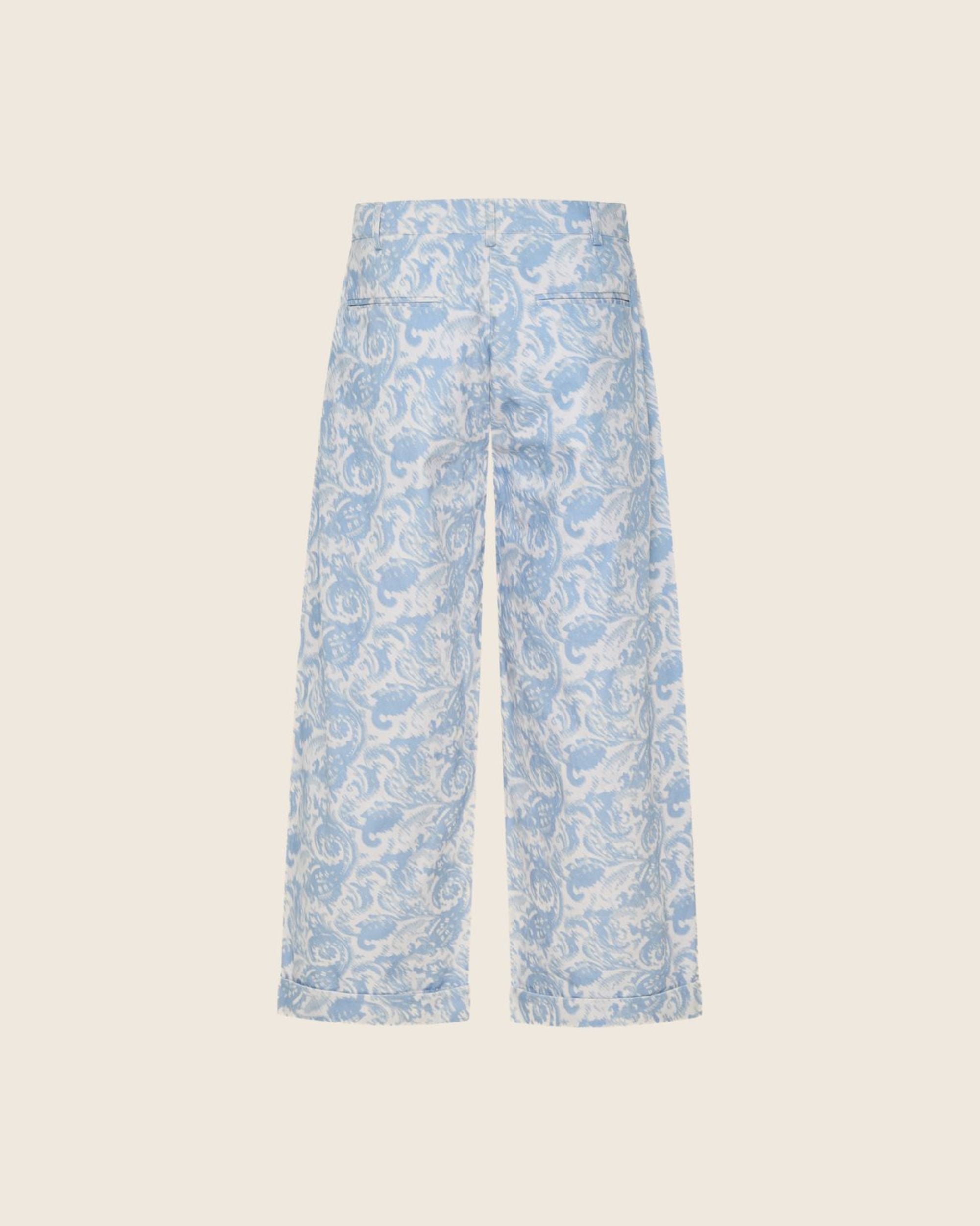 ghosted back image of paisley print trouser in light blue