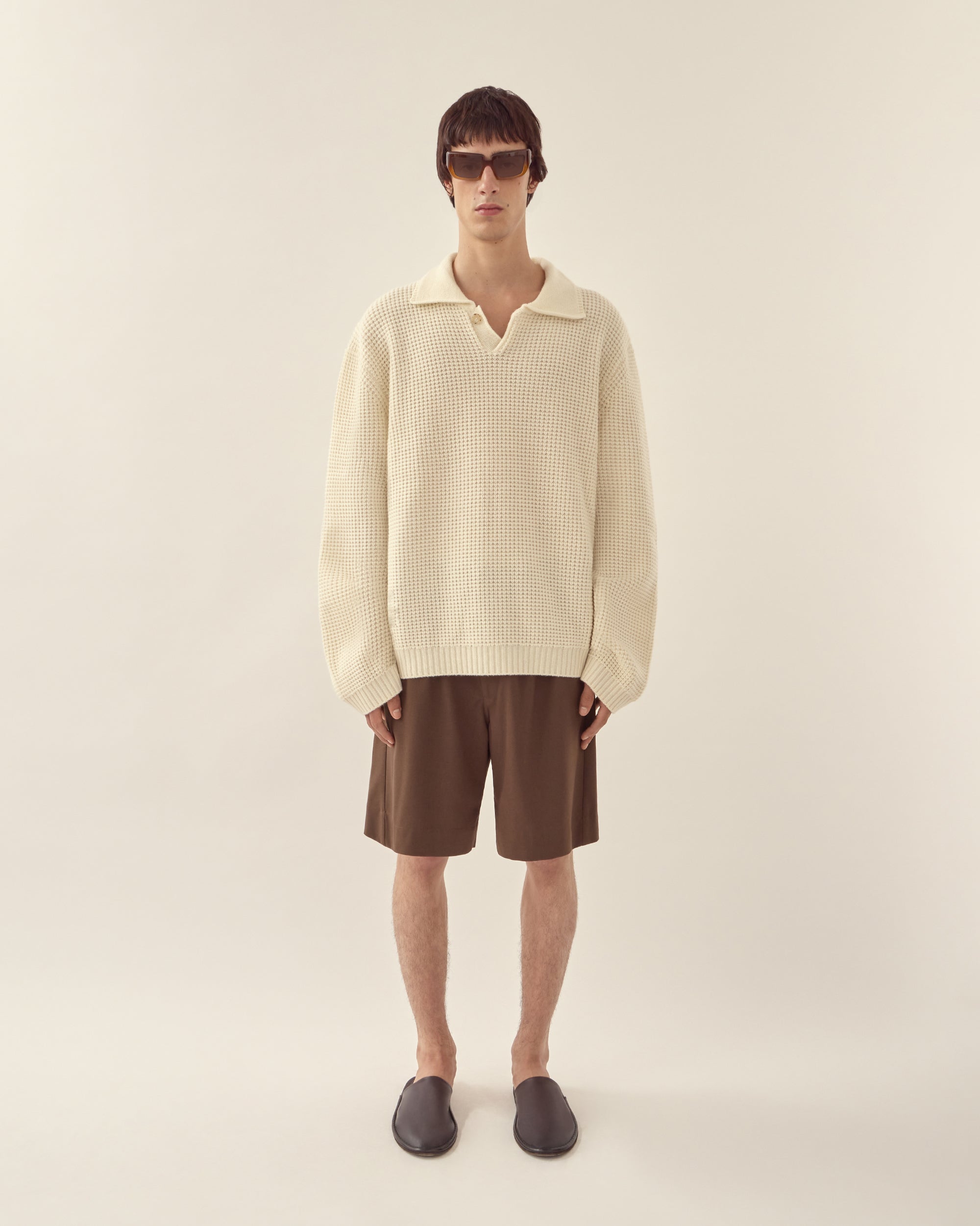 Front view of men's wool cashmere collared sweater in off white.